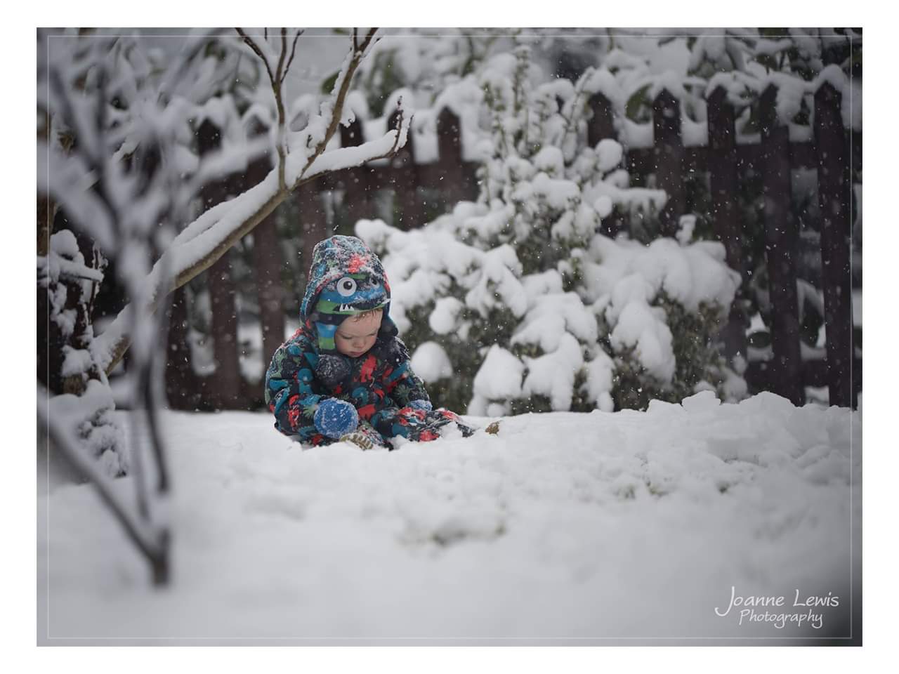 Boys sitting in the snow
