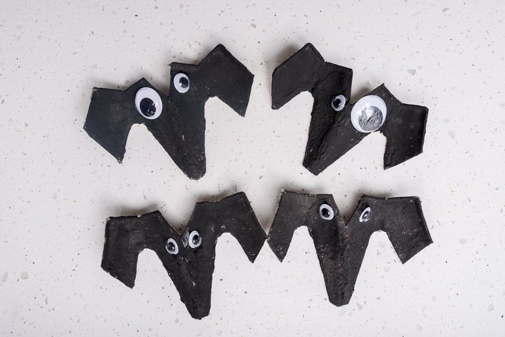 black egg box craft ghosts with stick on google eyes