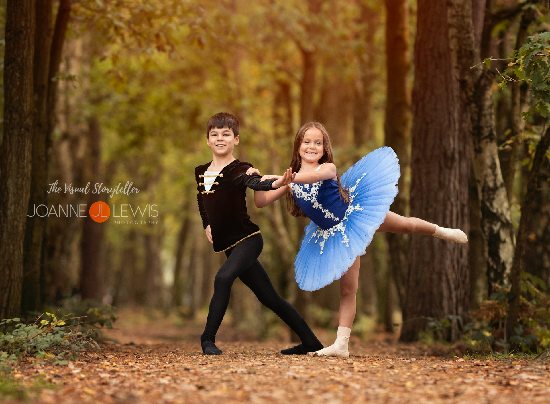 Young male and female dancer posing in ballet clothes and tutu