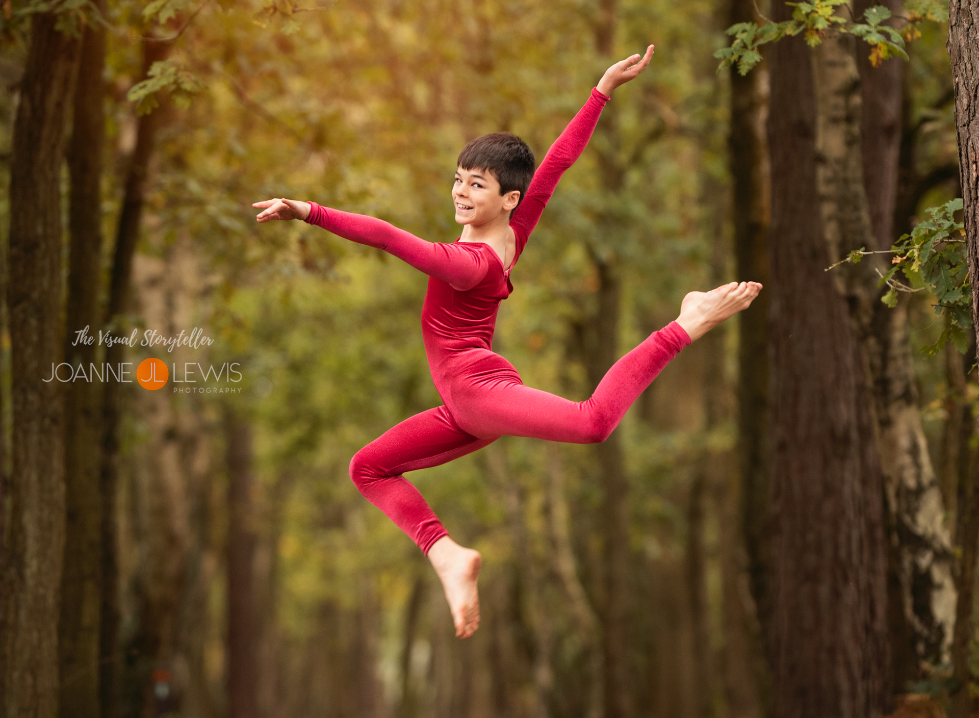 Dancer doing acrobatics in the woods