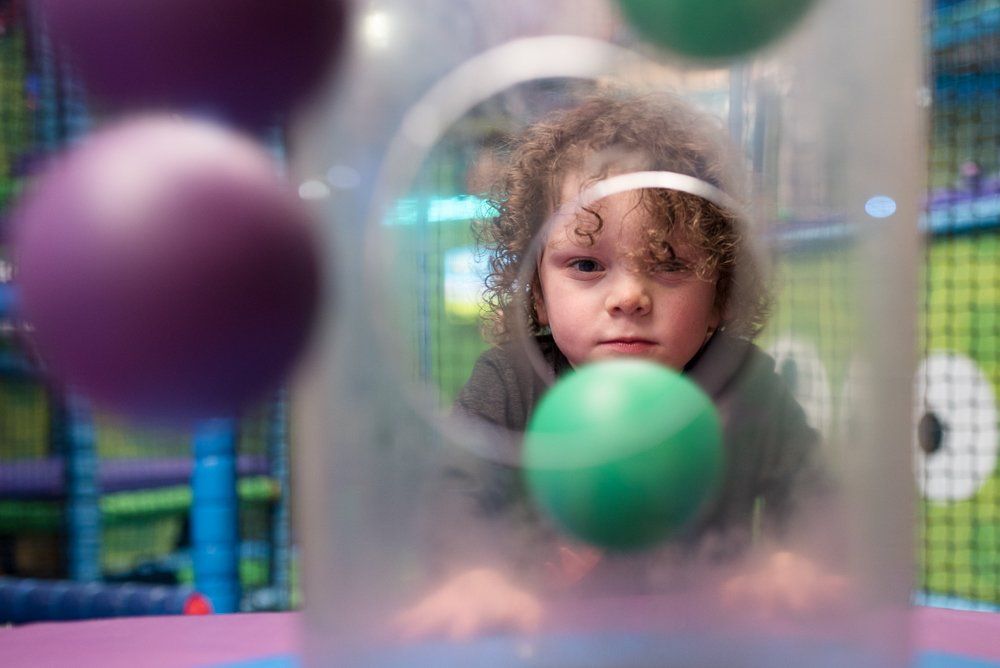 Watching floating bubbles in soft play bubble vacuum