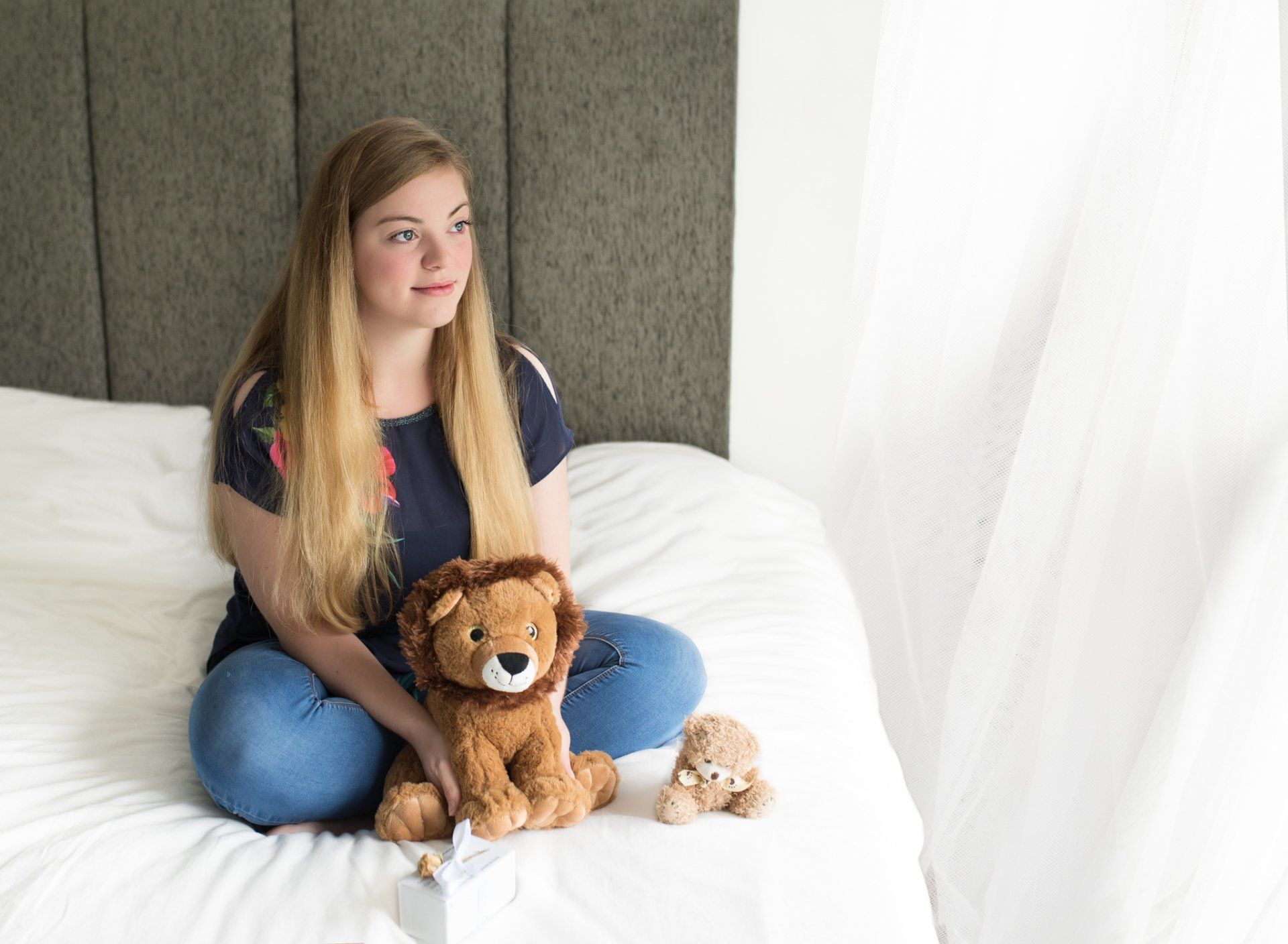 Hannah with a lion for Leo, his teddy, and his ashes
