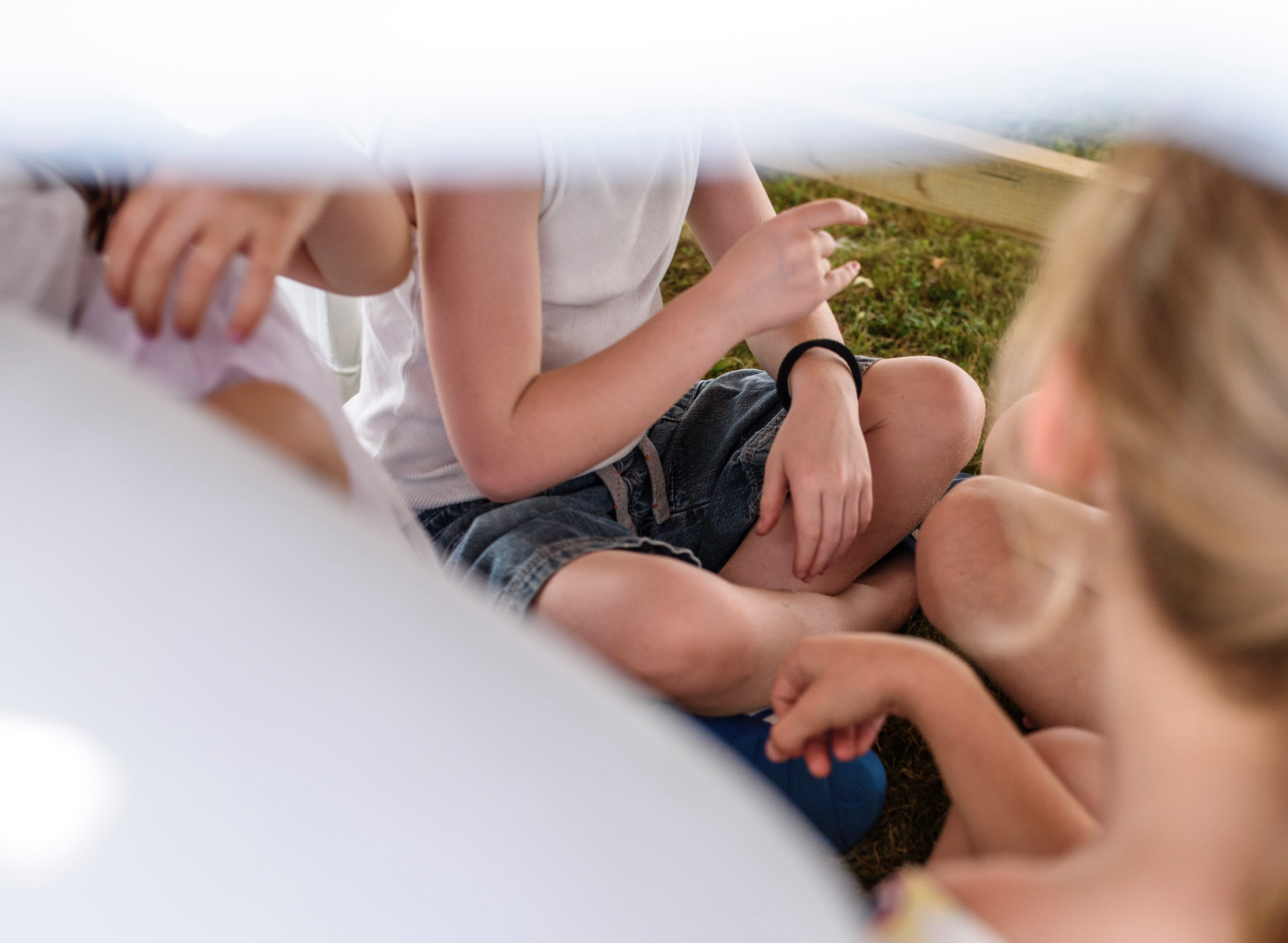 Girls playing under the table at birthday party