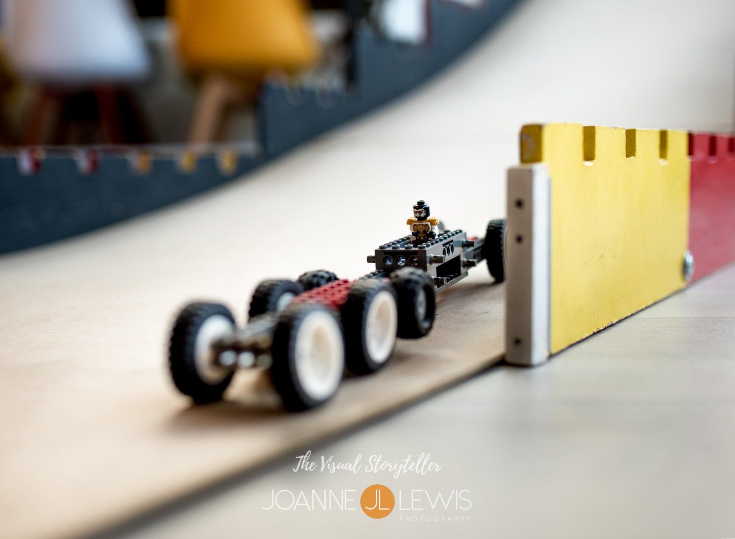 Lego car racing down a master builders car ramp at Hertford Party