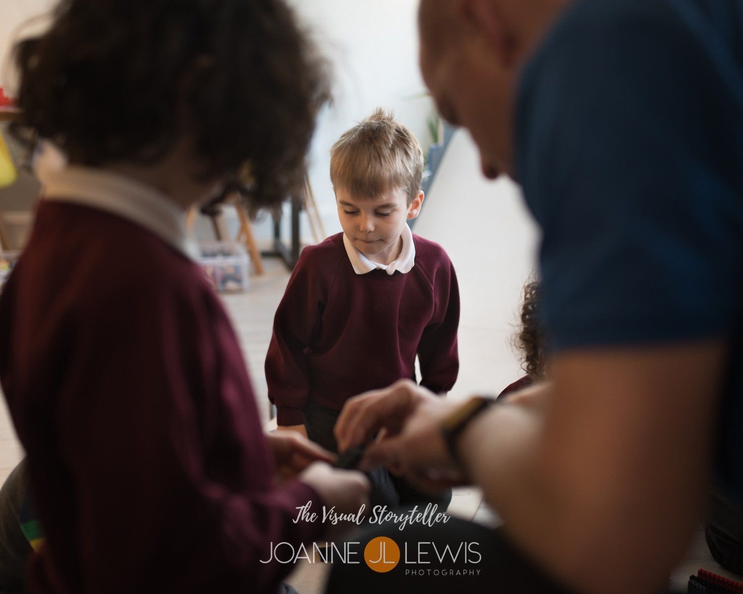 Darren from Master Builders helping children build lego catapults
