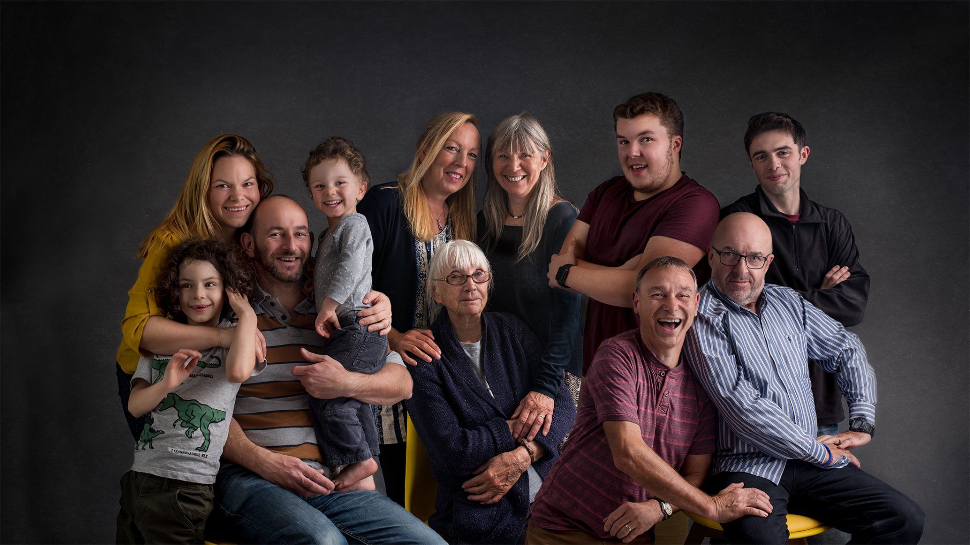 Large family photographed by Joanne Lewis Photography in Hertford Studio
