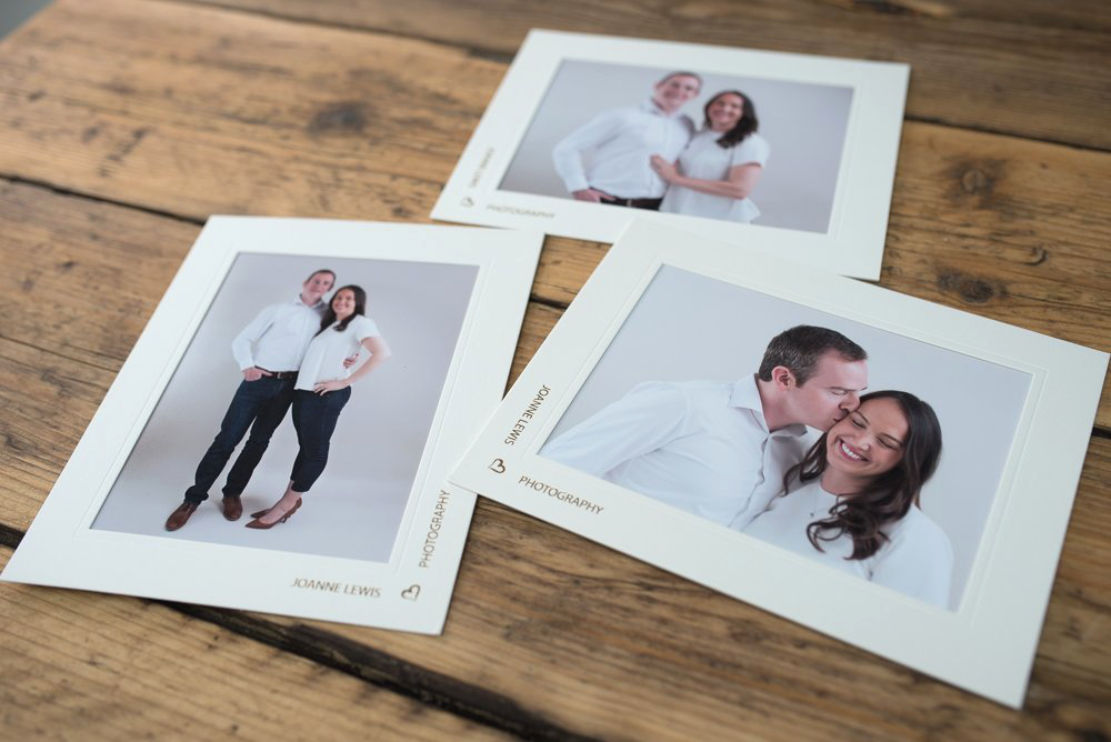 Engagement photos taken in a studio printed and mounted