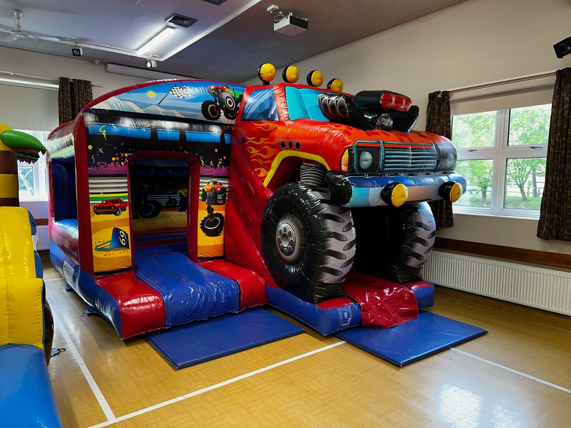 Monster Truck Slide Bouncy Castle from Bury Soft Play