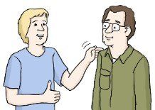 Person klopft anderen Person auf Schulter