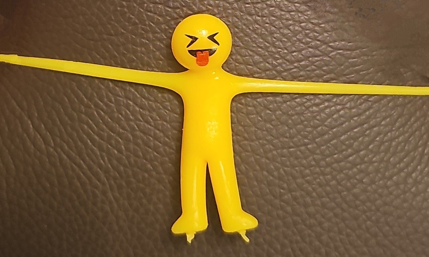 A stretchy yellow man being stretched.