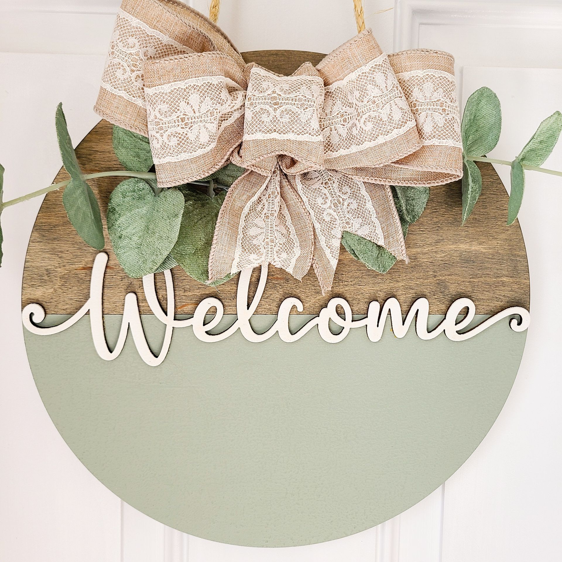 wooden welcome sign neutral colors