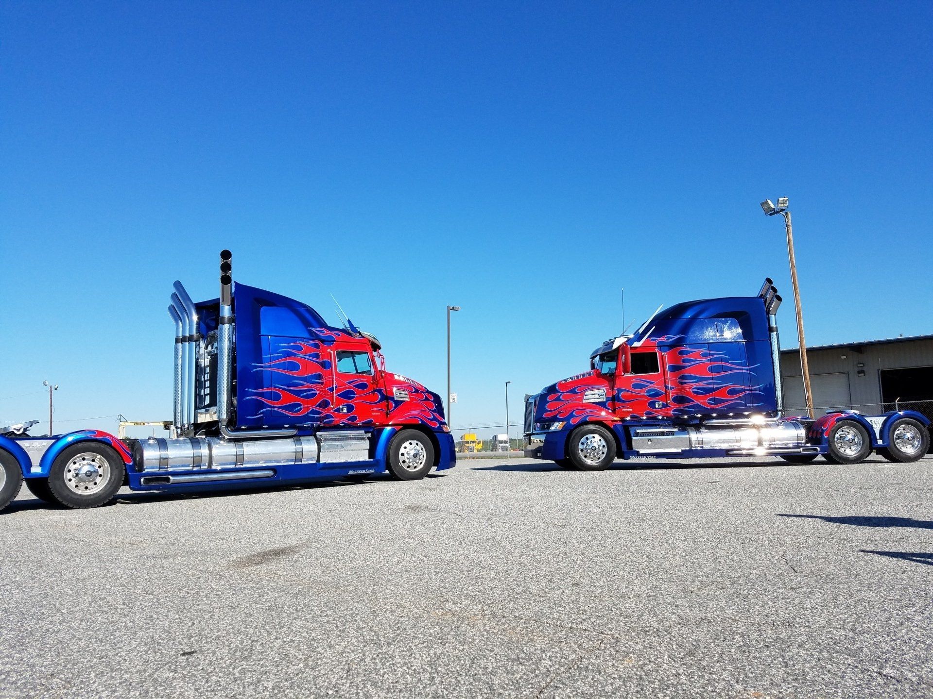 Replica Optimus Prime side-by-side with original Optimus