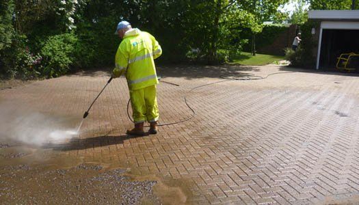 High Pressure Cleaning a drive and patio