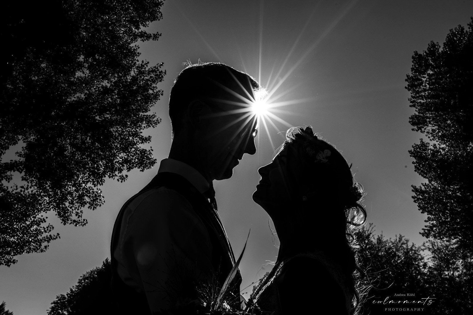 brautpaar silhouette blendenstern hochzeitsfotograf chiemgau chiemsee