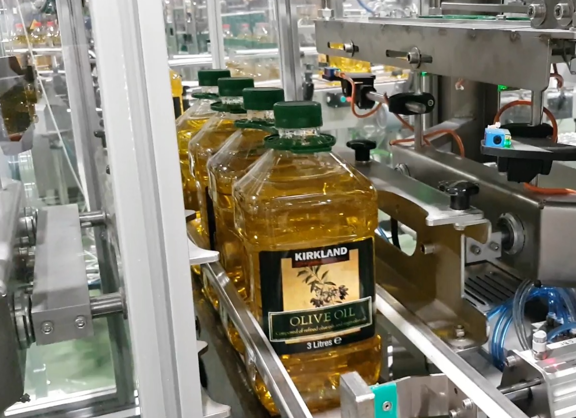 Transportador de botellas o envases OBTINDU