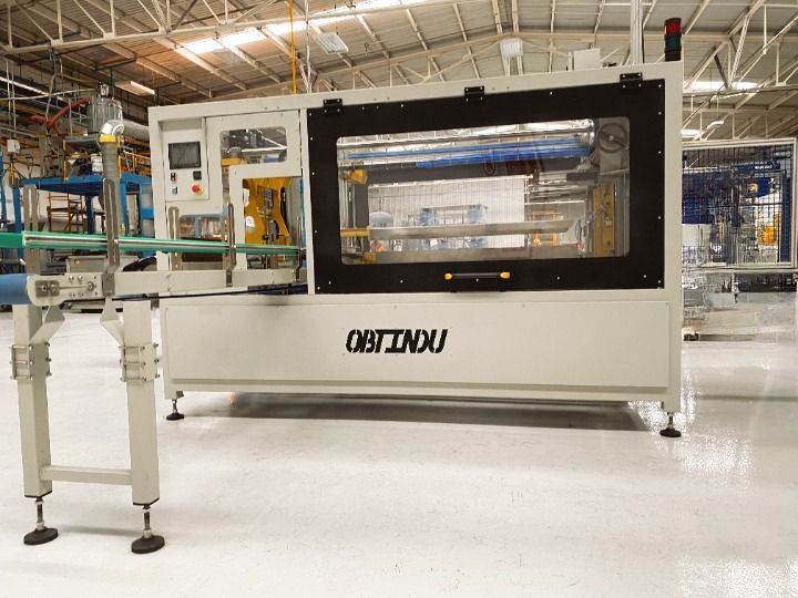 Empaquetadora botellas de plástico en bolsas OBTINDU