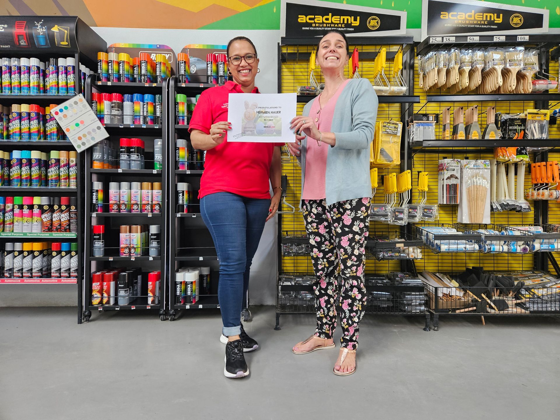 Easter competition 2025 winners standing out among colorful paint cans and golden egg designs