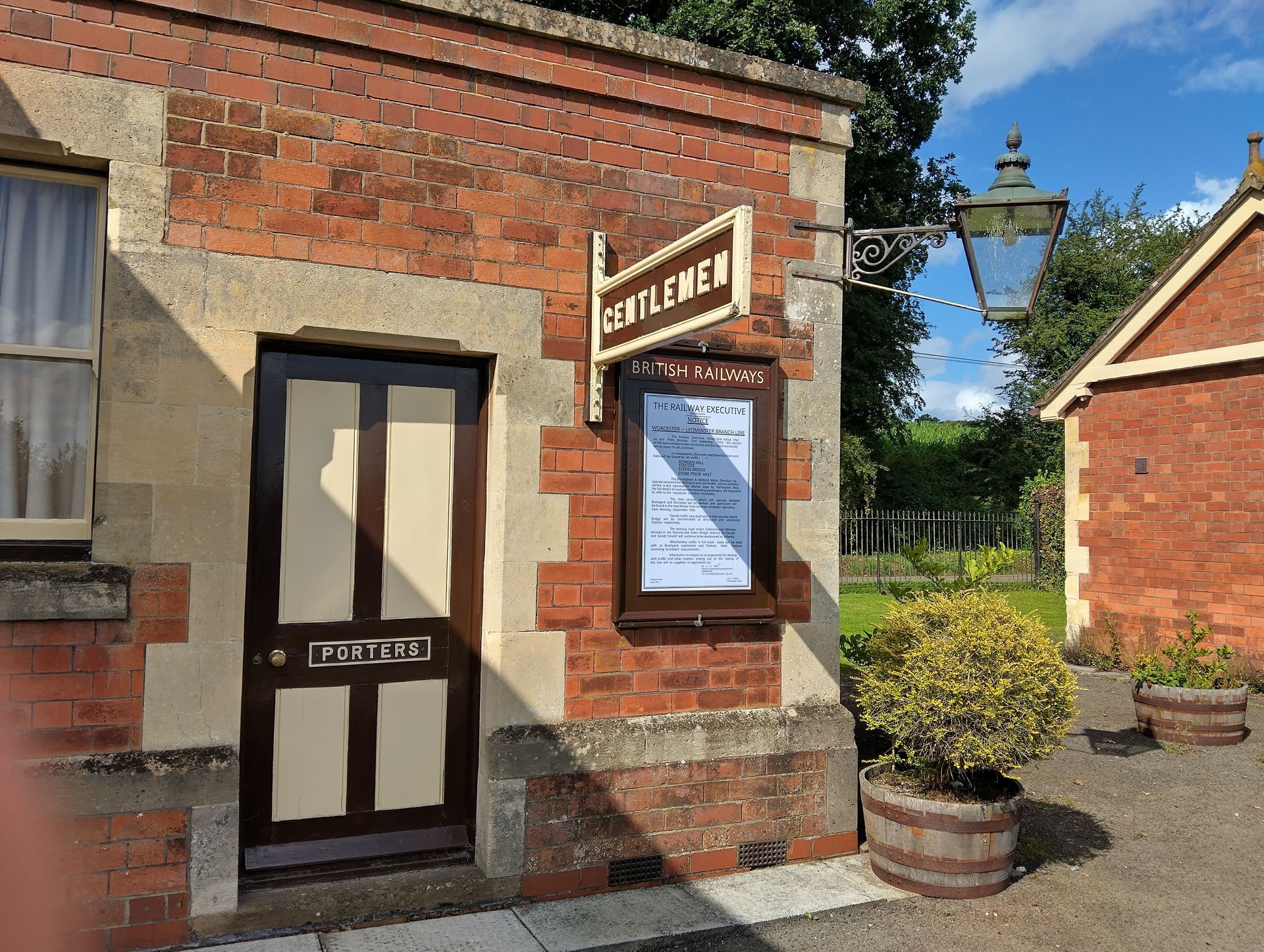 The railway closure sign poster is shown clearly here on the corner of the building by the platform door of the Porters Room