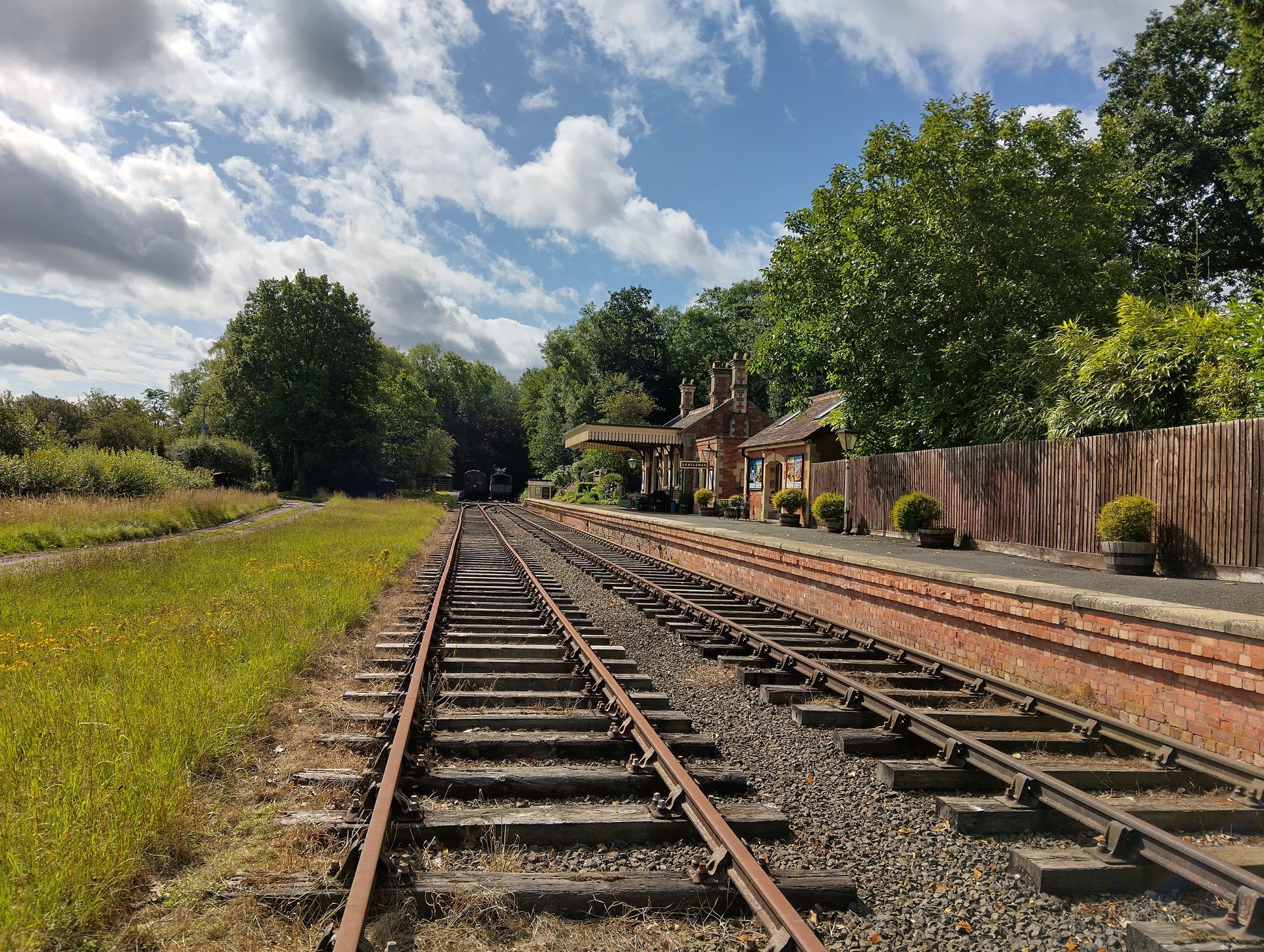 A railway track view of Rowden Mill Station as seen from the northern level crossing