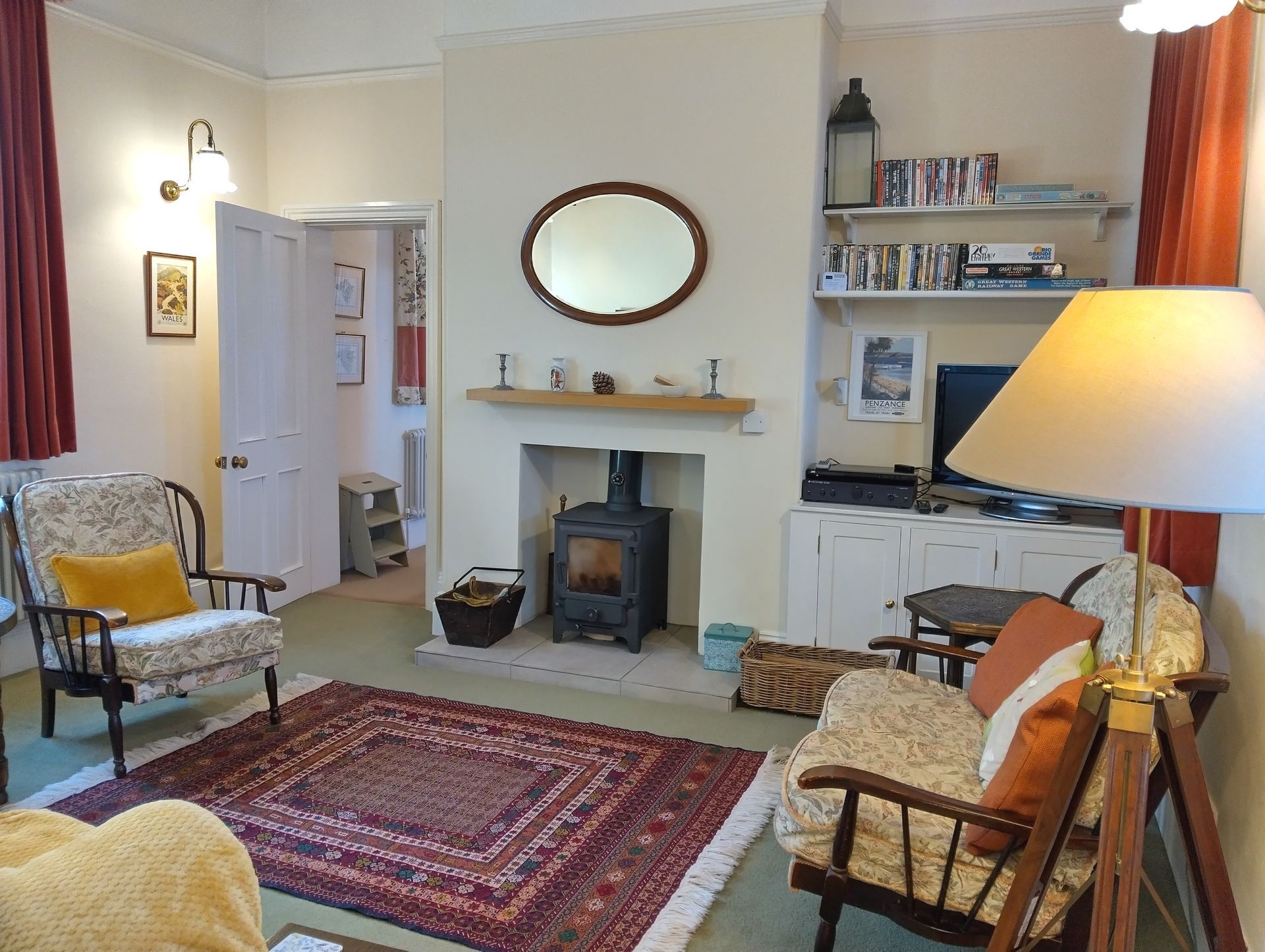 The lounge at the Station building is housed at the former Waiting Room. With its dual aspect windows if a well-lit room with a focal point of the wood-burning stove and its mantle piece with an oval mirror above it. The central heating is well supplemented by the output of the log burner for a cosy autumn days and winter warmth.