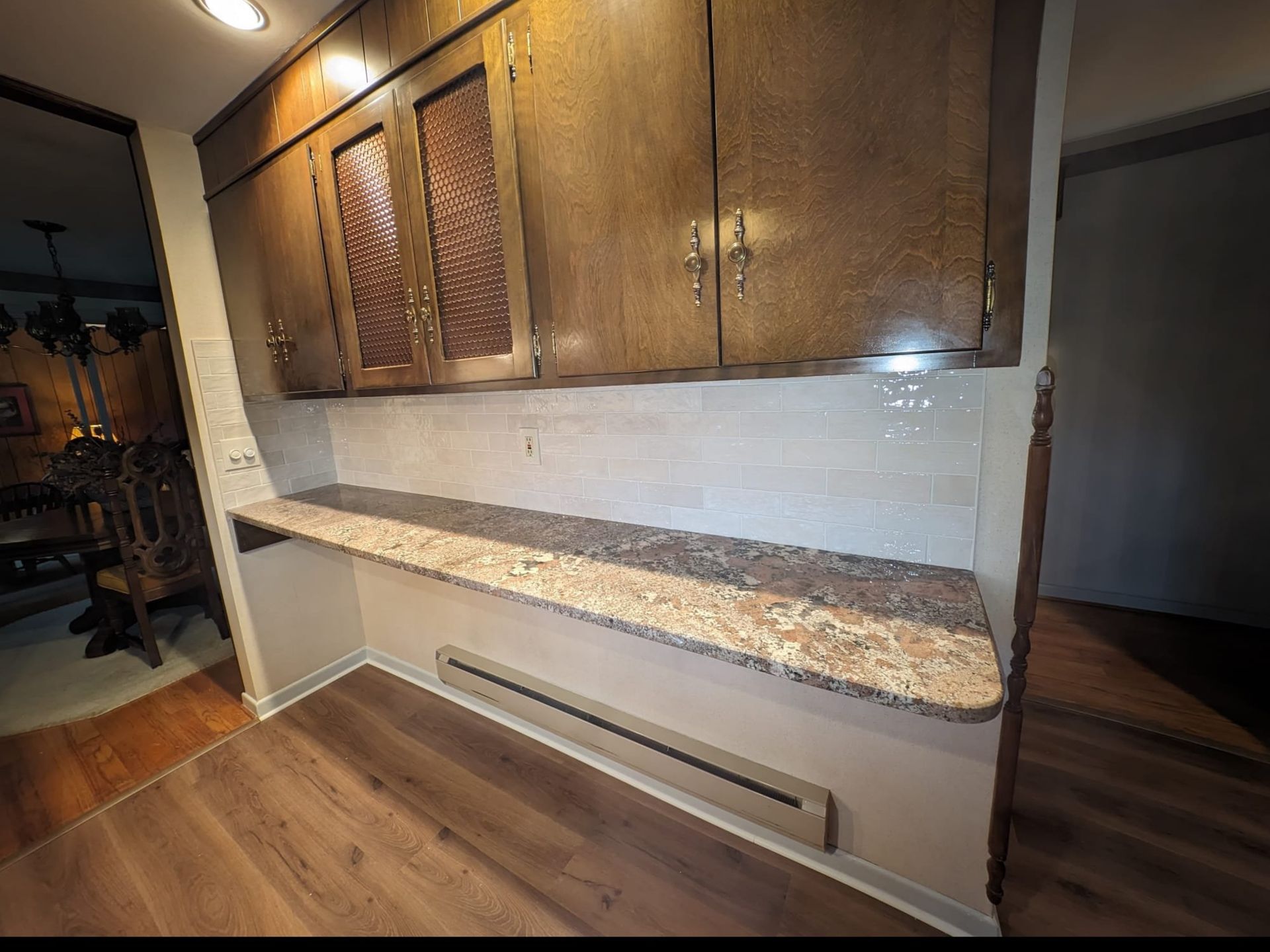 Newly remodeled kitchen island featuring updated countertops and design