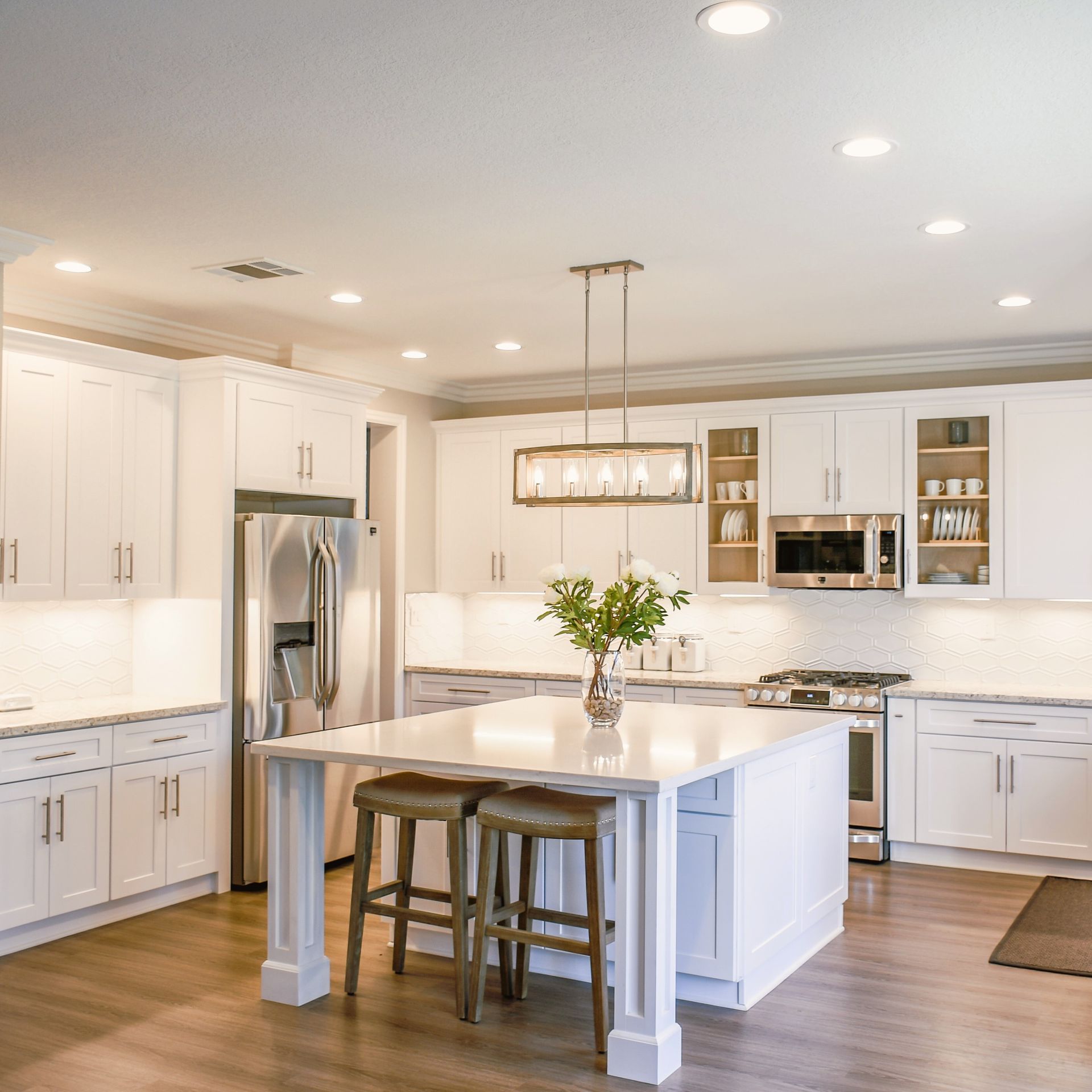 Modern white and marble kitchen island remodel with seating