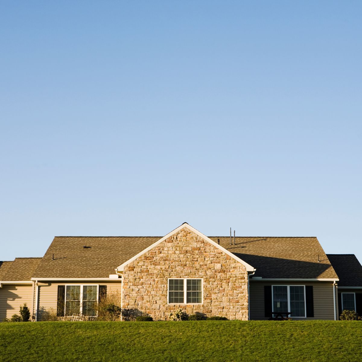 Upgrade older home exteriors Stone ranch home exterior representing older home modernization projects in Lehigh Valley