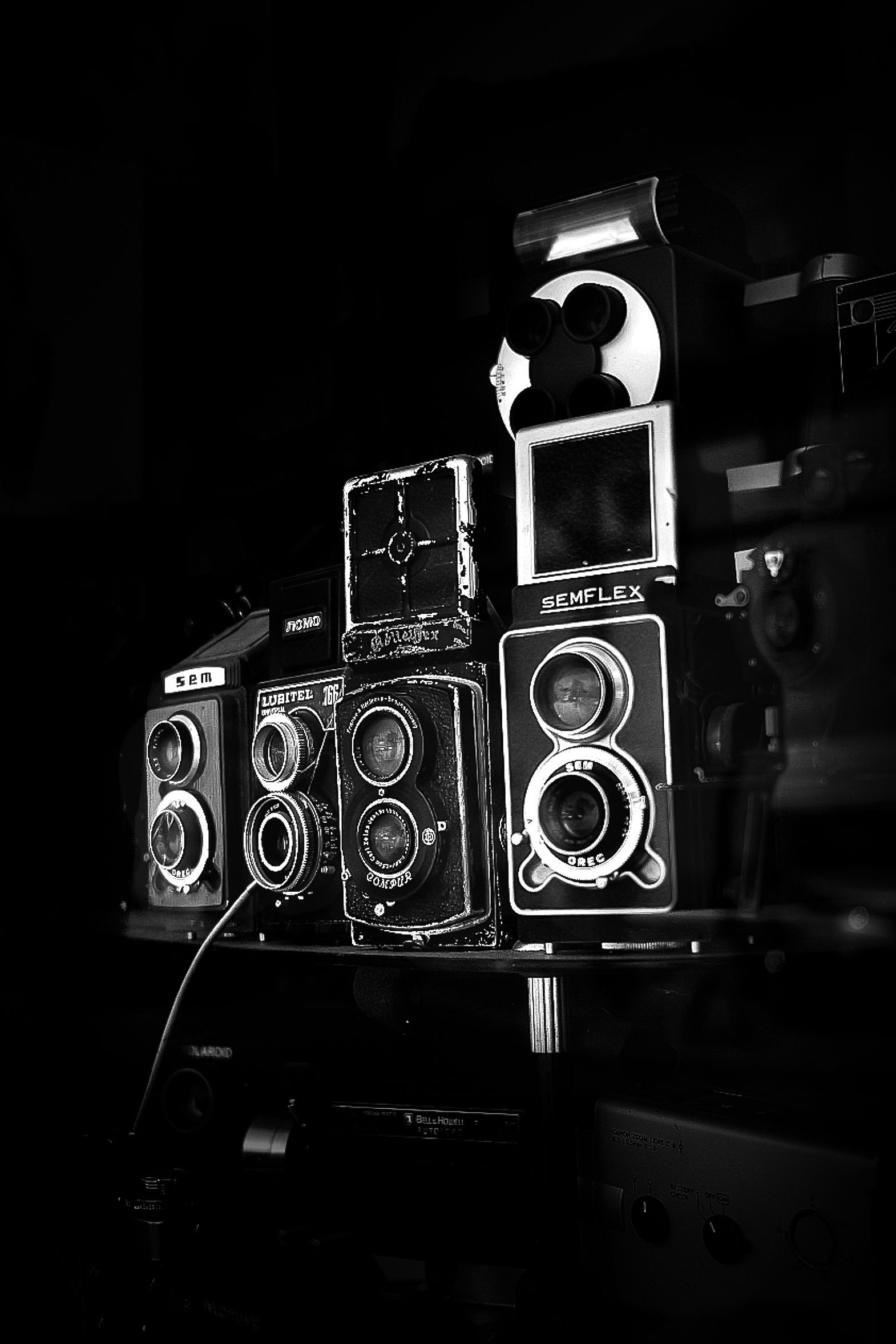 Détails d'un magasin de photo tenu par un monsieur de 96 ans