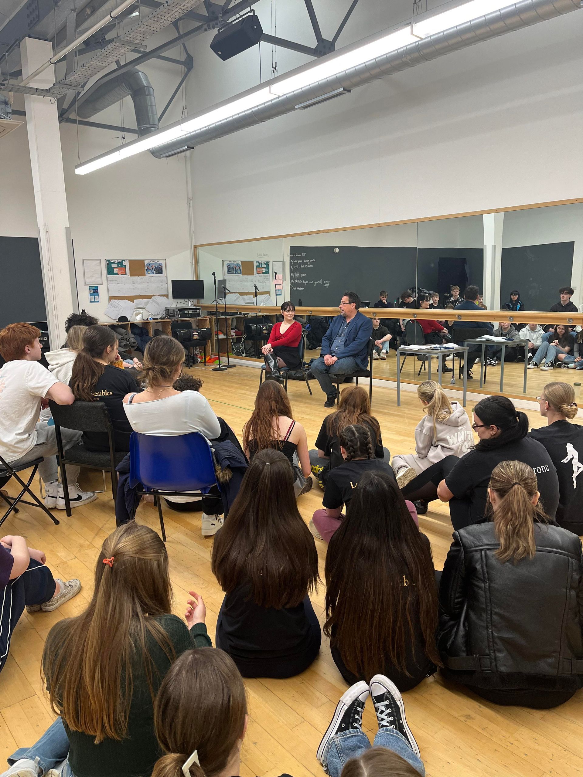 Director Matt Hewitt and Actor Rosy Church chat to the cast at rehearsals