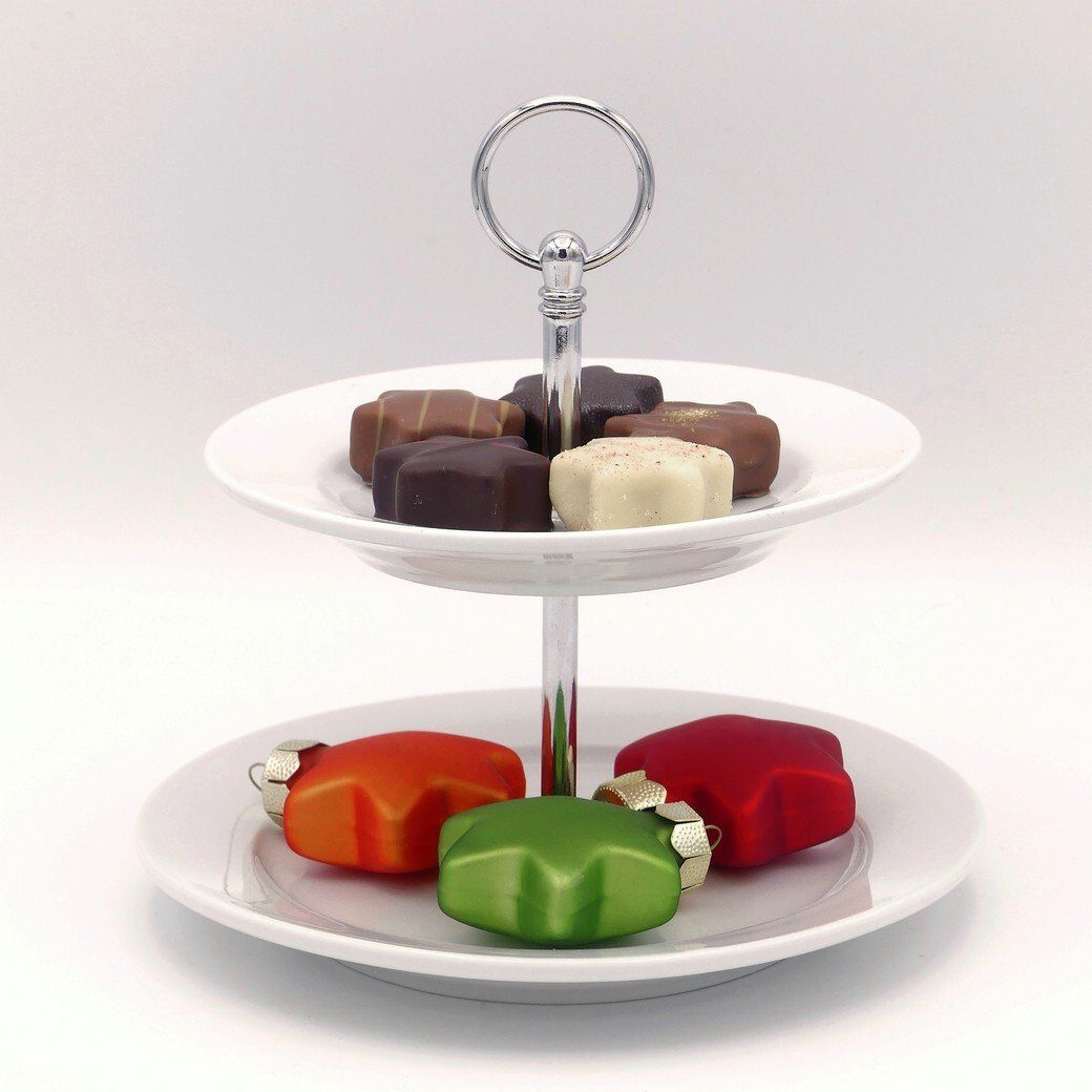 Weihnachtssterne auf einer Etagere Weihnachtssterne auf einer Etagere