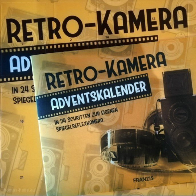 Adventskalender aus dem Franzis-Verlag Verpackung und Anleitung zur Kamera aus dem Kalender