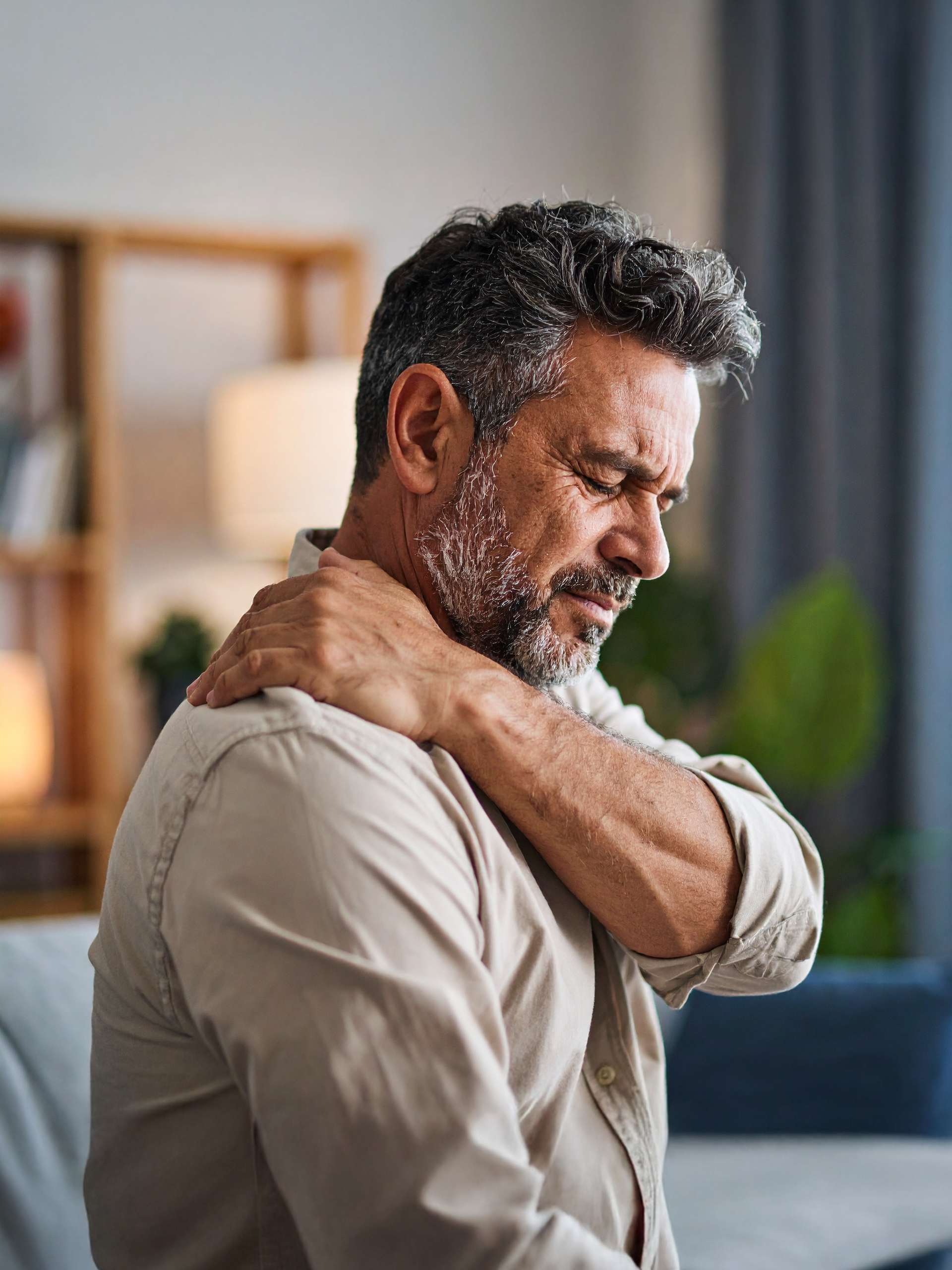 Man in his 50s with neck pain.