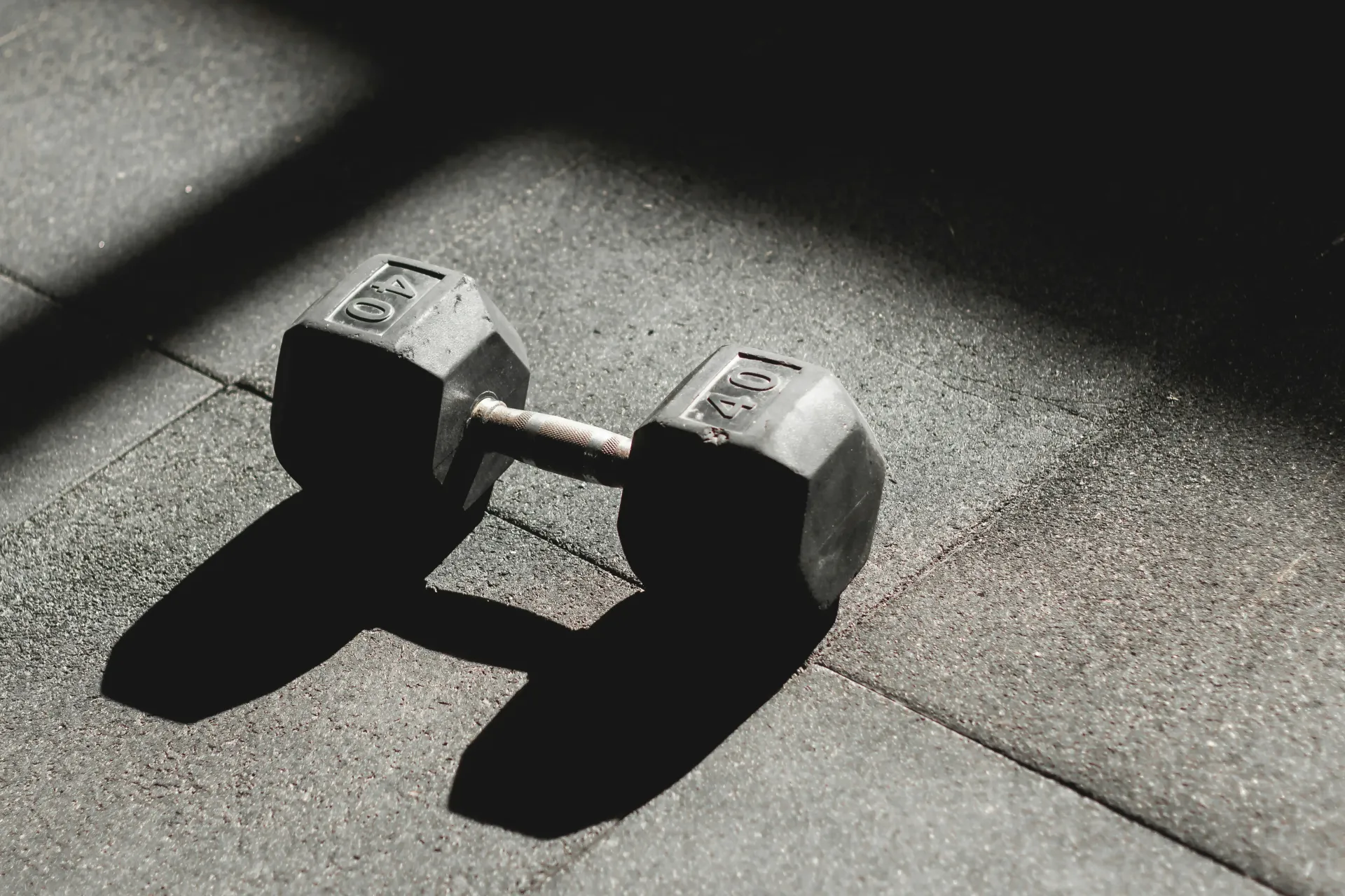 Dumb bell weight on ground
