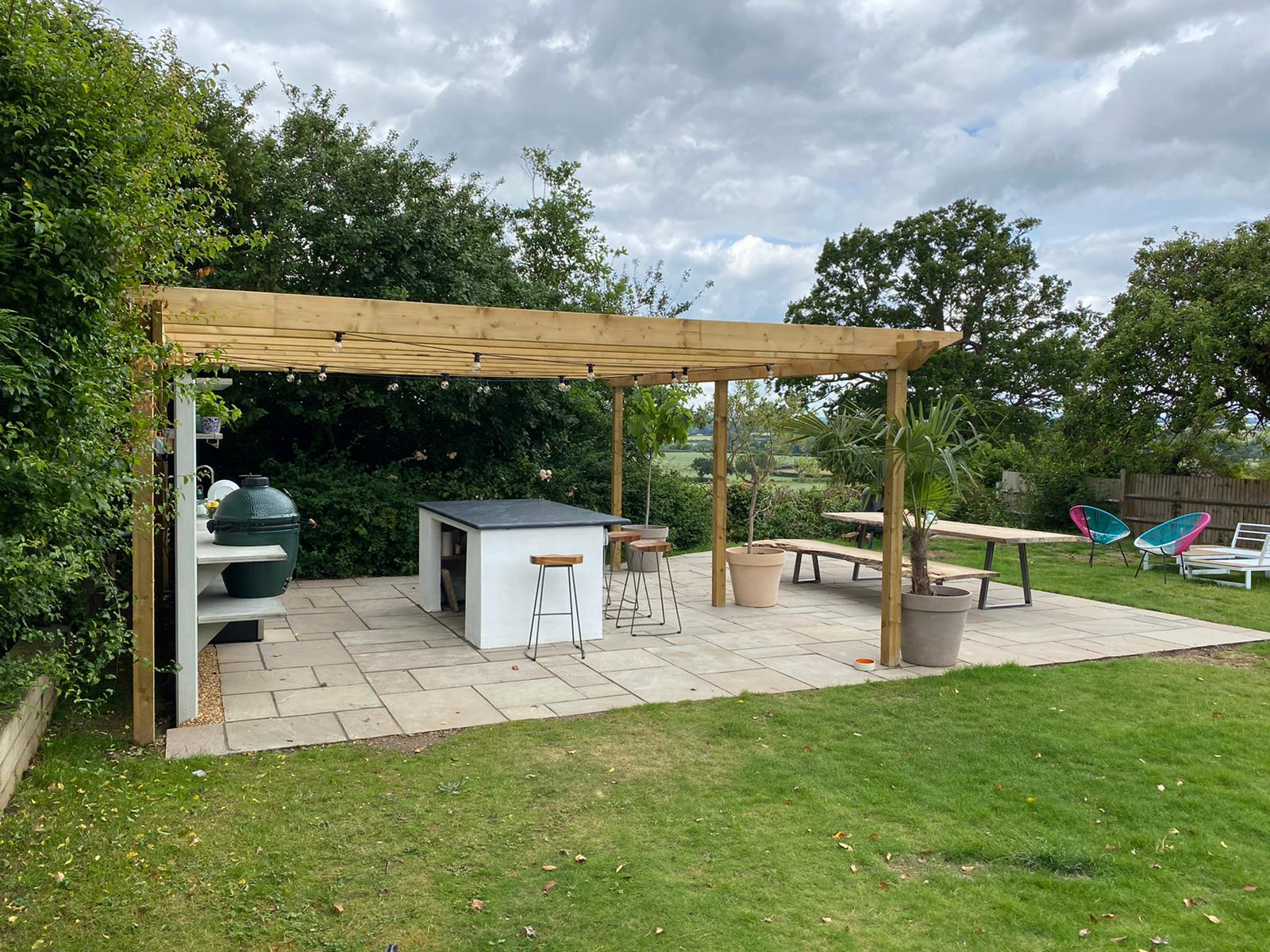Wooden pergola and paving