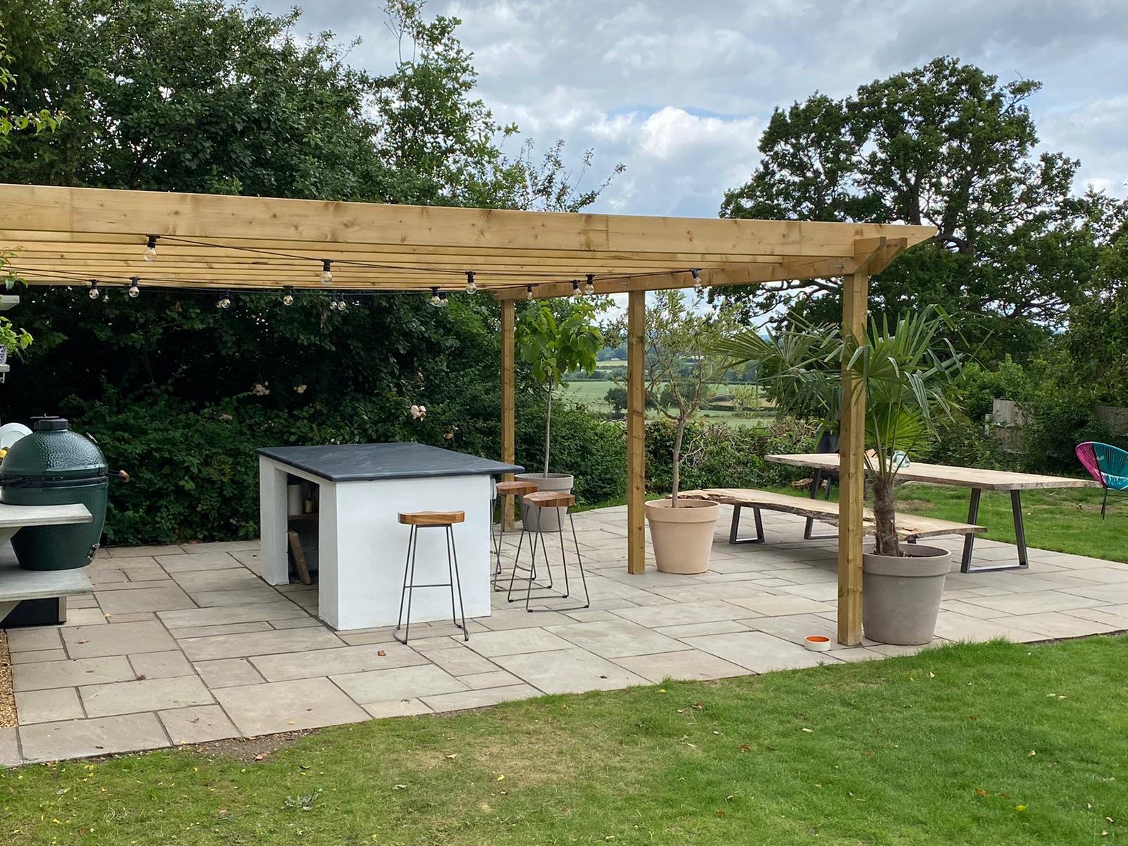 Wooden pergola and paving