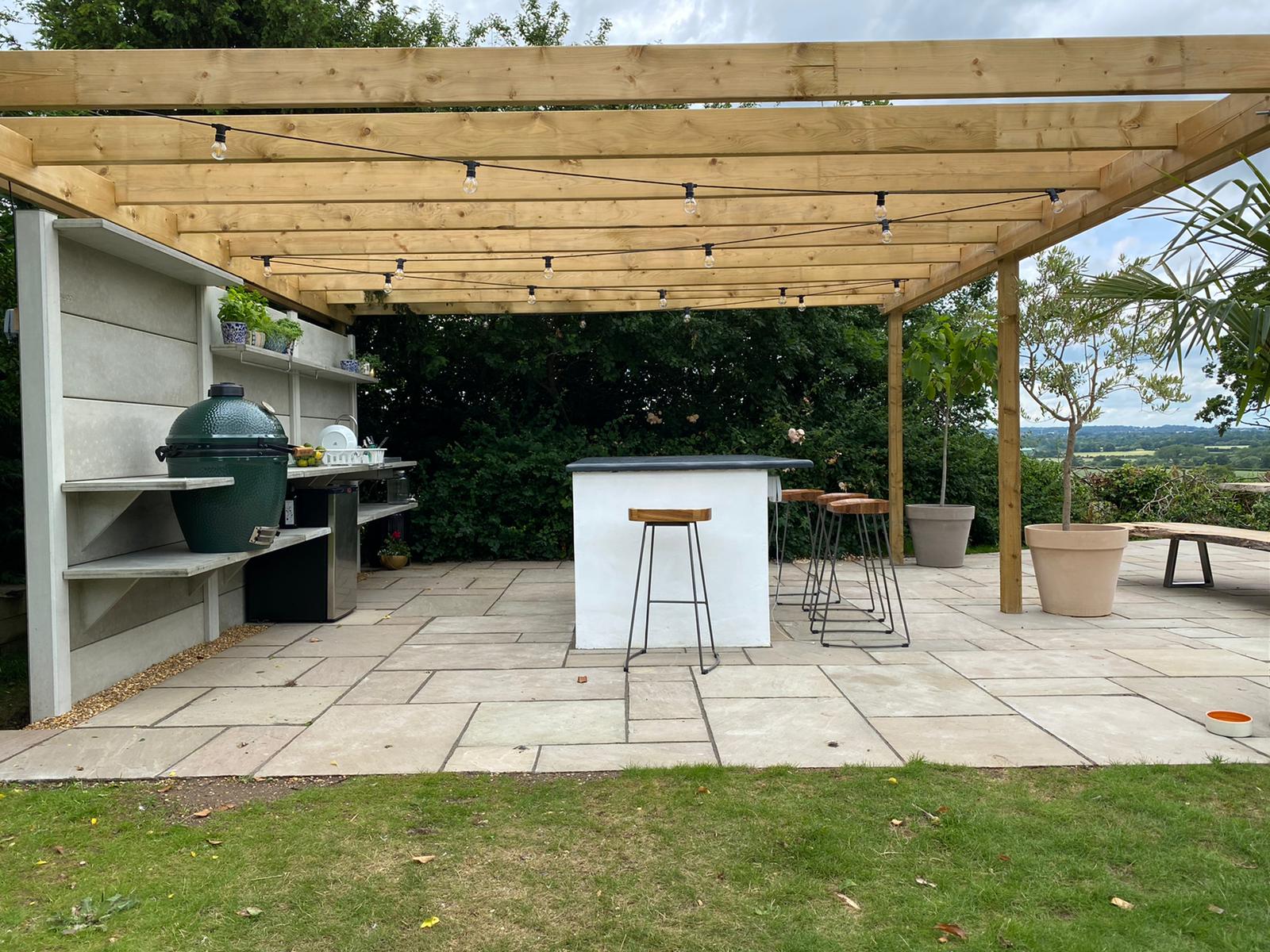 Wooden pergola and paving