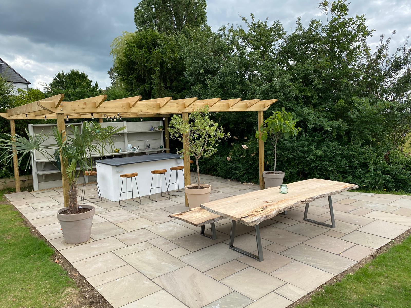 Wooden pergola and paving
