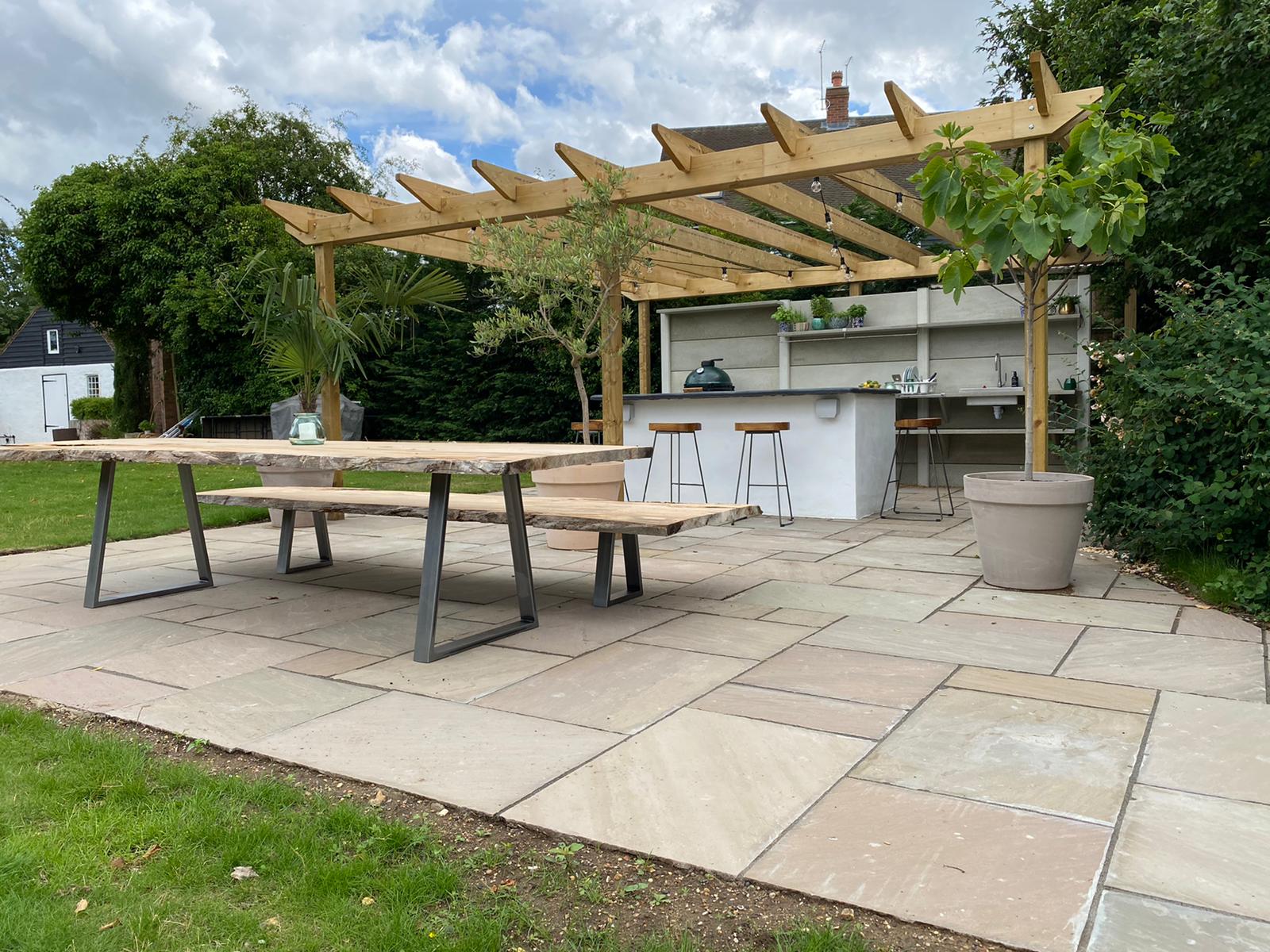 Wooden pergola and paving
