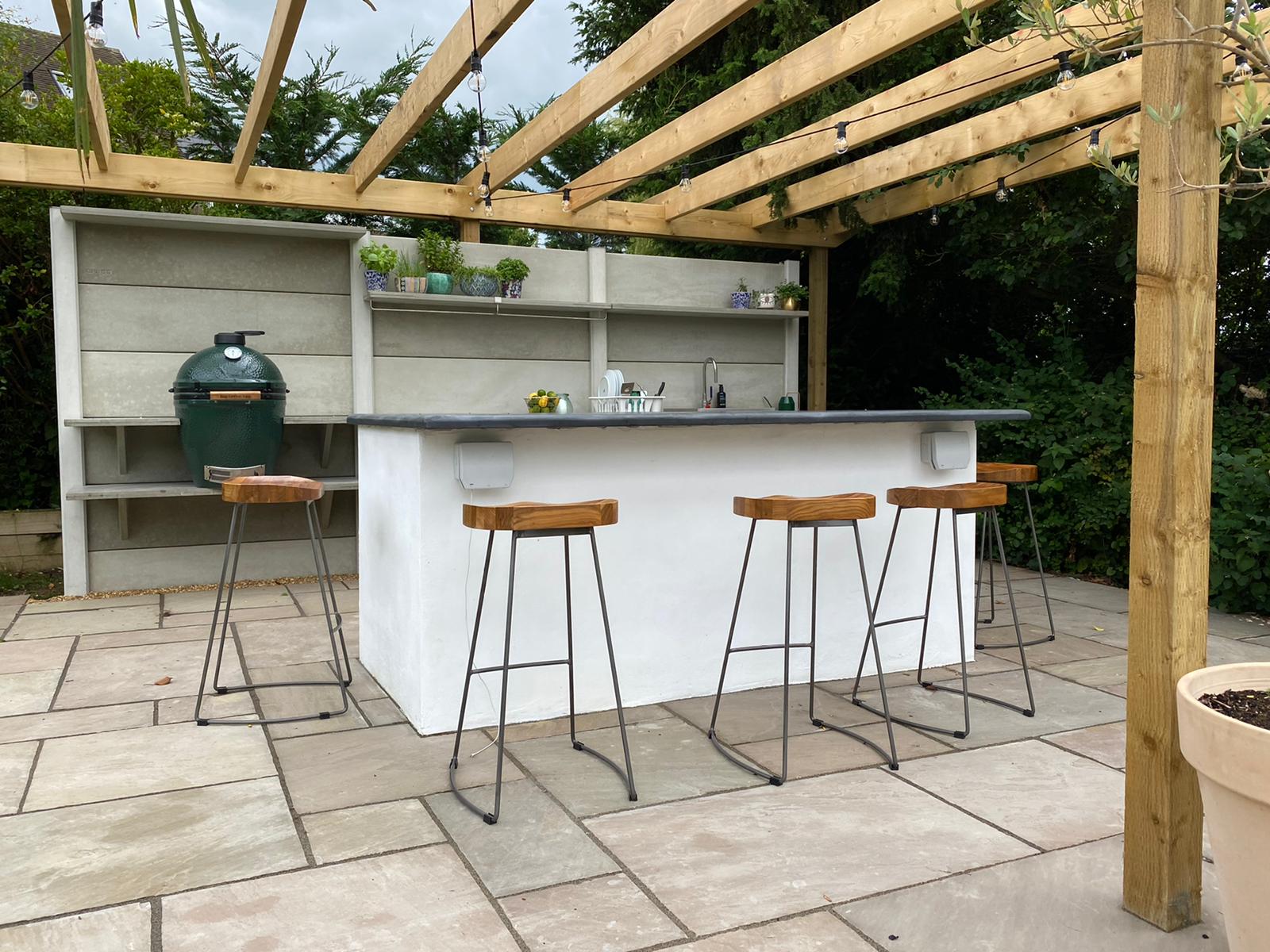 Wooden pergola and paving