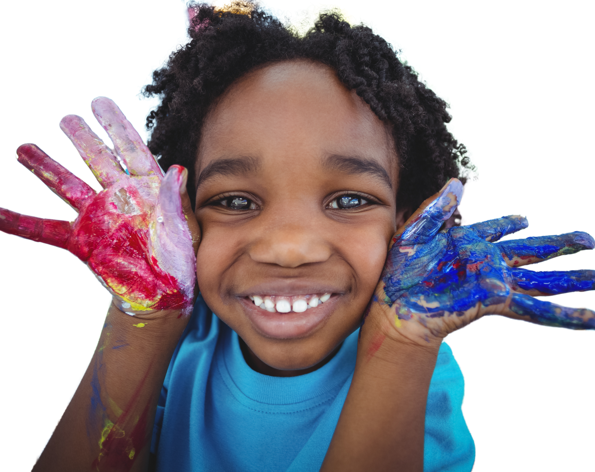 A happy child showing paint-covered hands from finger painting.