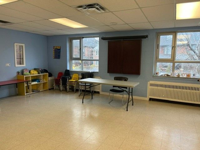 The party room with table and chairs.
