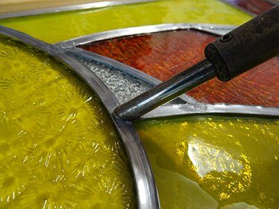 Vitrail Danse du Soleil, Brasure à l'étain