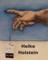 Visitenkarte von Heike Holstein: Zeigefinger mit Hinweisschild