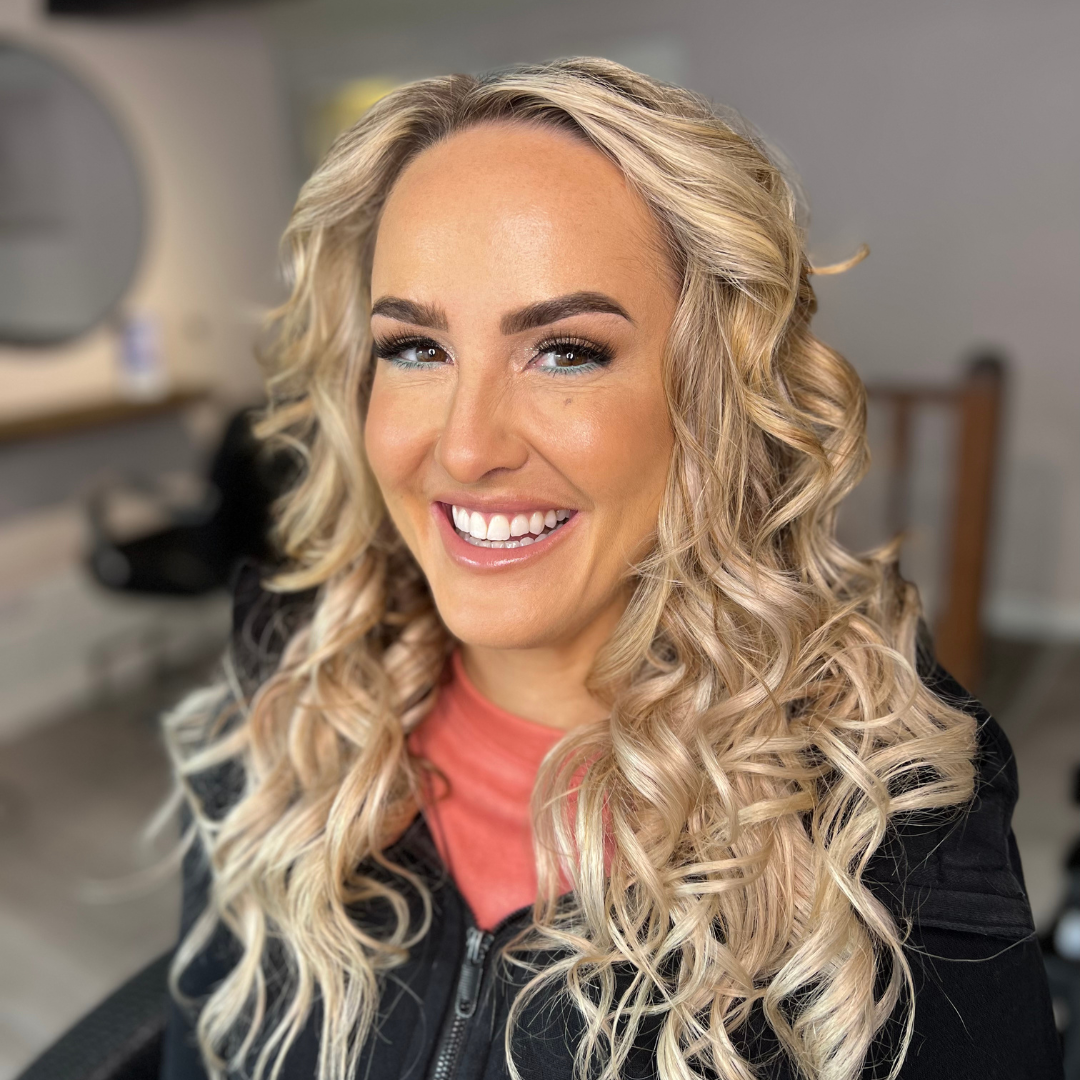 Big blonde beach waves, smiling, beautiful, bronze fresh faced skin, aqua blue under waterline. hair and makeup in cheshire at harry jon hair and makeup. night out hair and makeup
