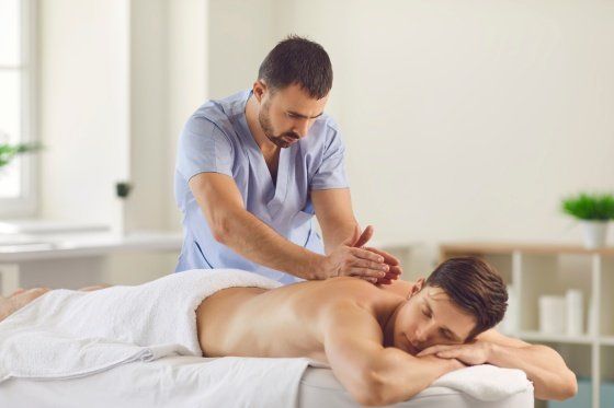 man being massaged