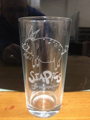 SeaPigs promotional drinking glass