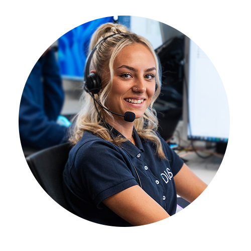 DUS customer service team member smiling and looking directly at the camera in a friendly manner.