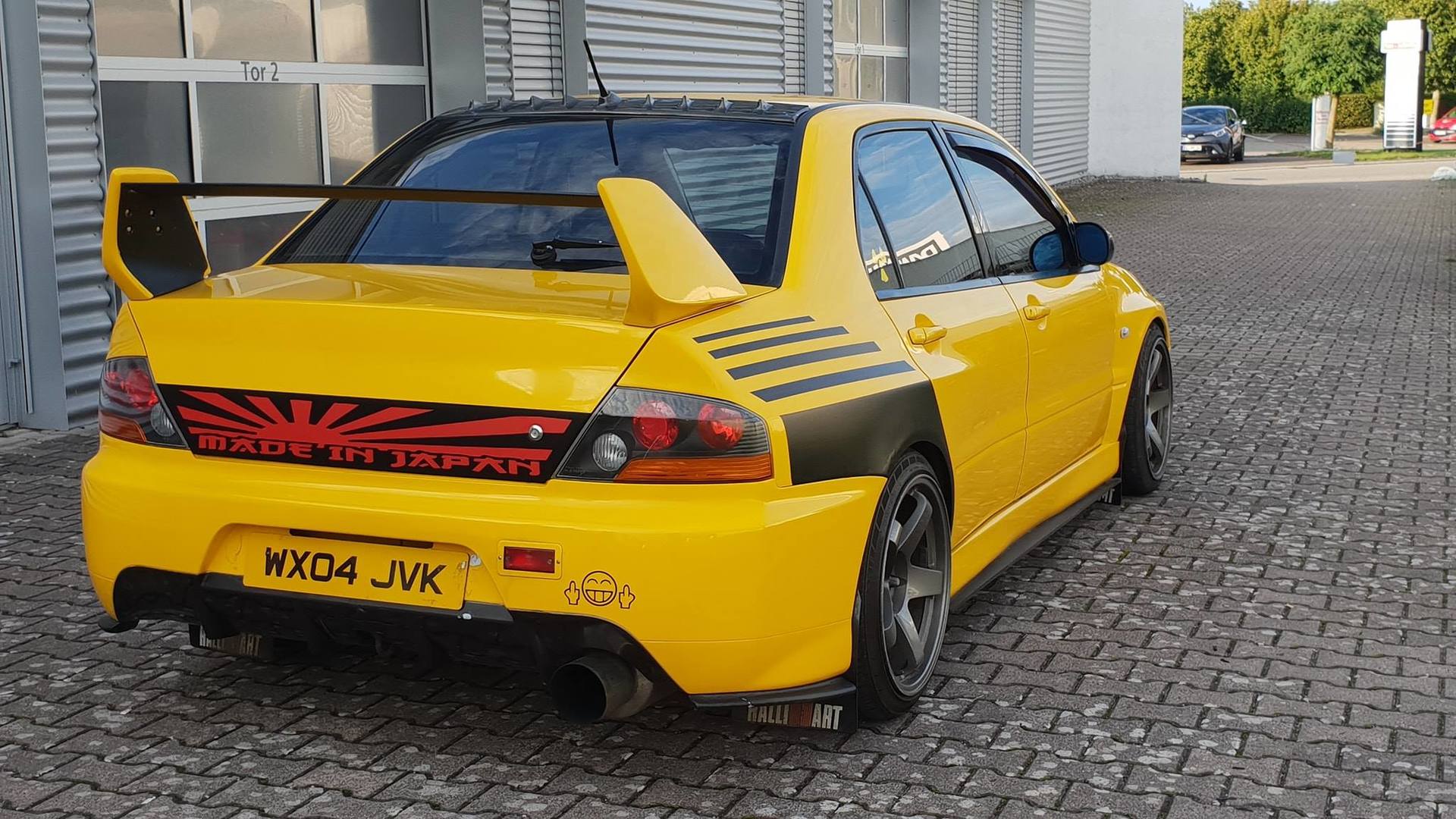 Heckansicht von Mitsubishi Lancer Evolution IX mit Folierung / Carwrapping.