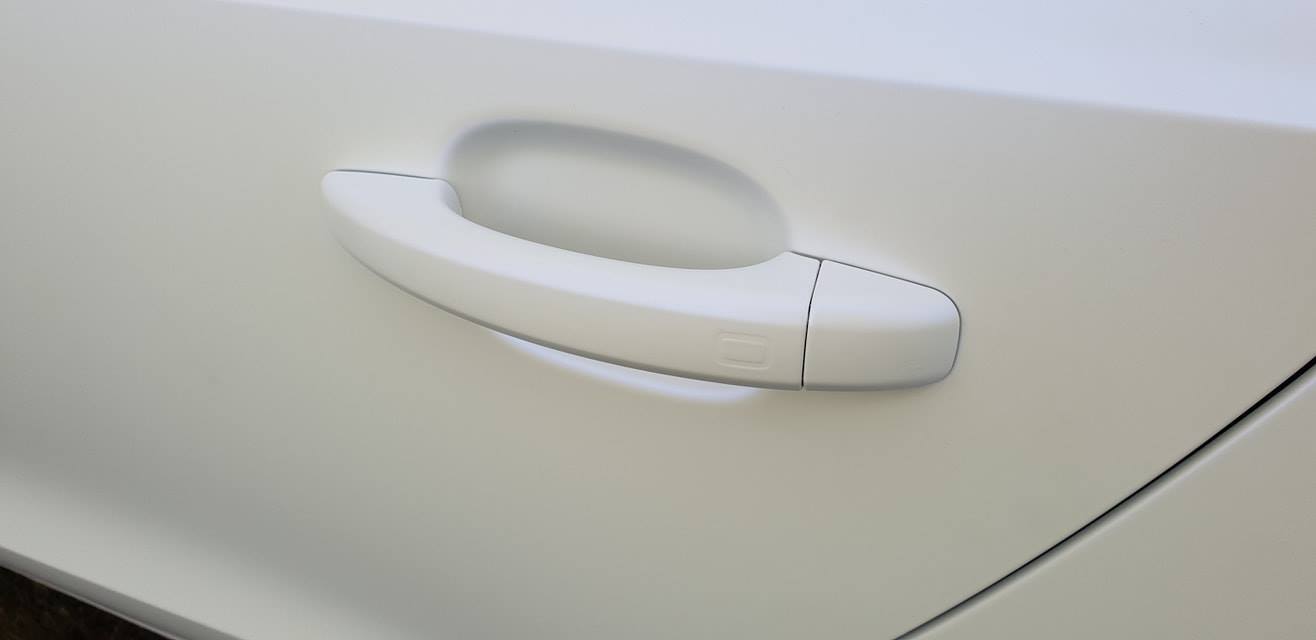 Detailansicht vom Türgriff von Folierung / Carwrapping an BMW E46.