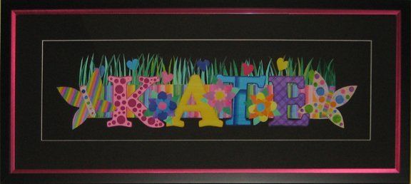 3D floral art of the girl's name   framed in with black wood and pink metal frames with black mats
